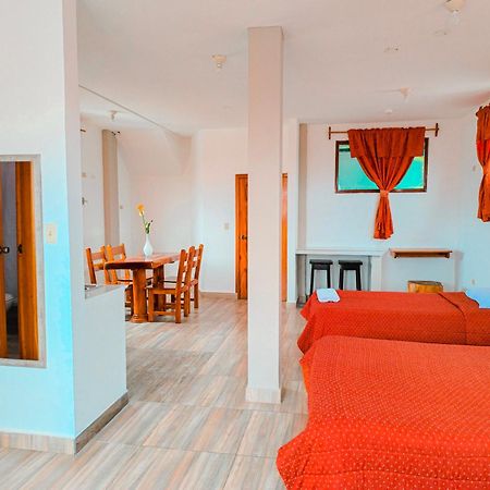 Suites En El Centro Пуэрто-Айора Экстерьер фото
