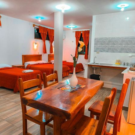 Suites En El Centro Пуэрто-Айора Экстерьер фото