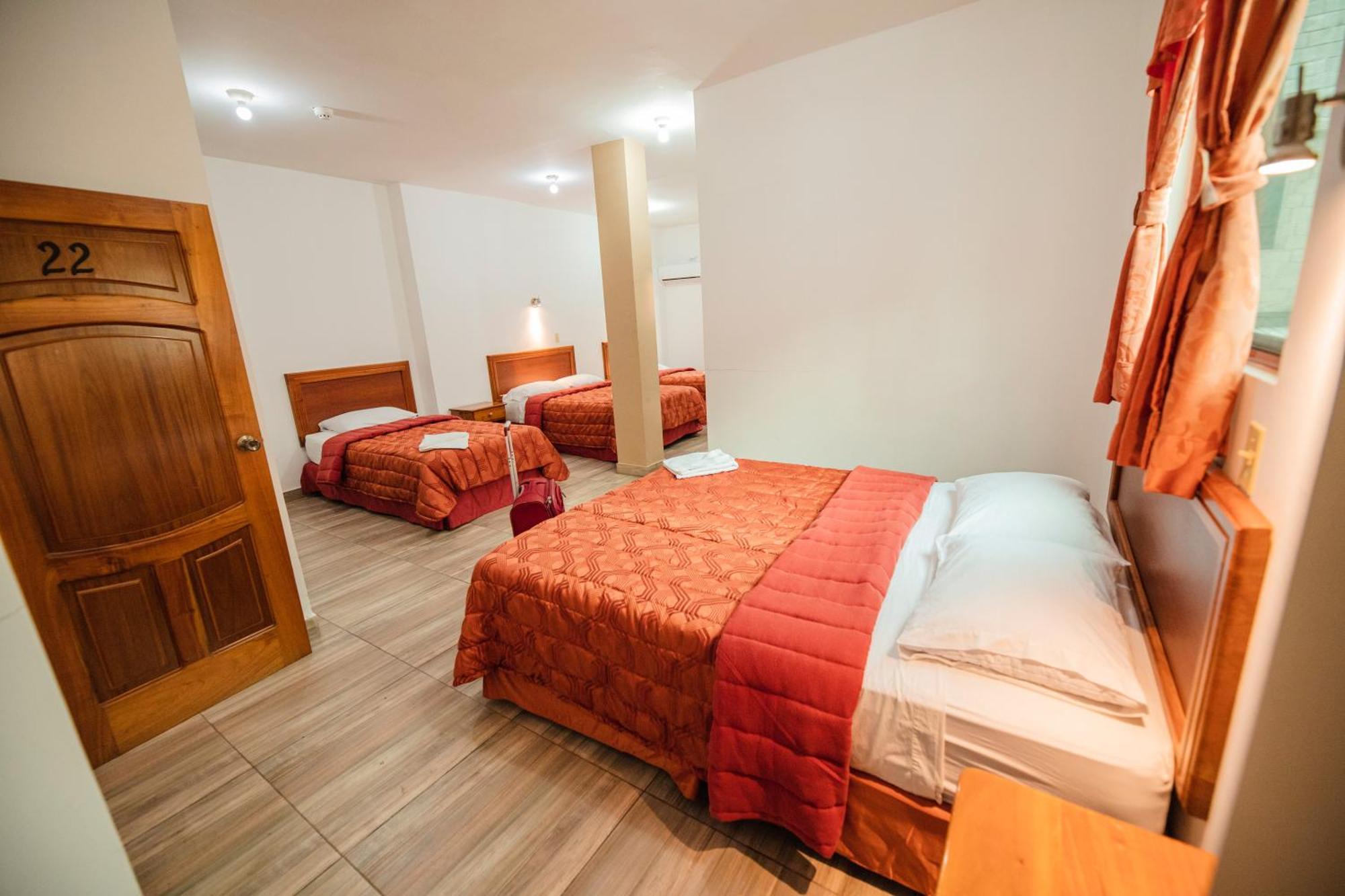 Suites En El Centro Пуэрто-Айора Экстерьер фото